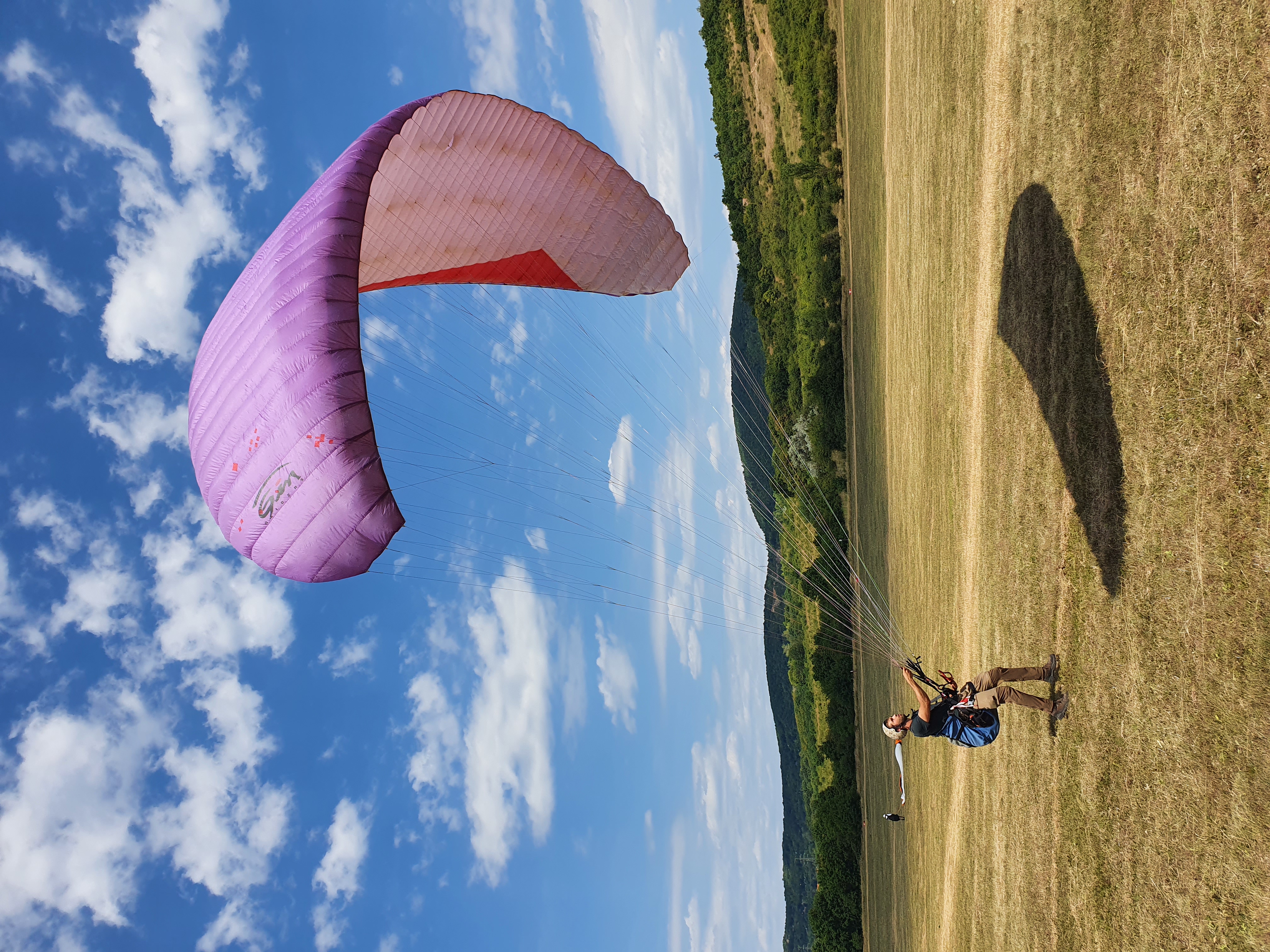 Paragliding in the open fields